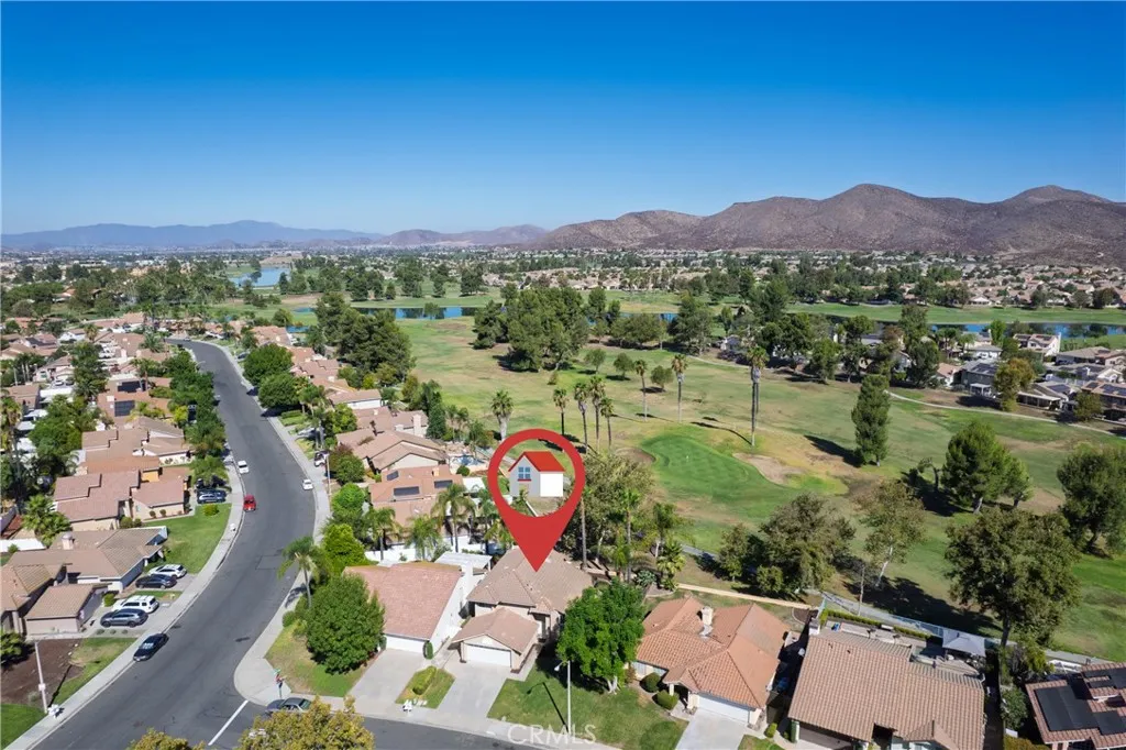 Aerial view with  the foothills and golf course in the in the background.