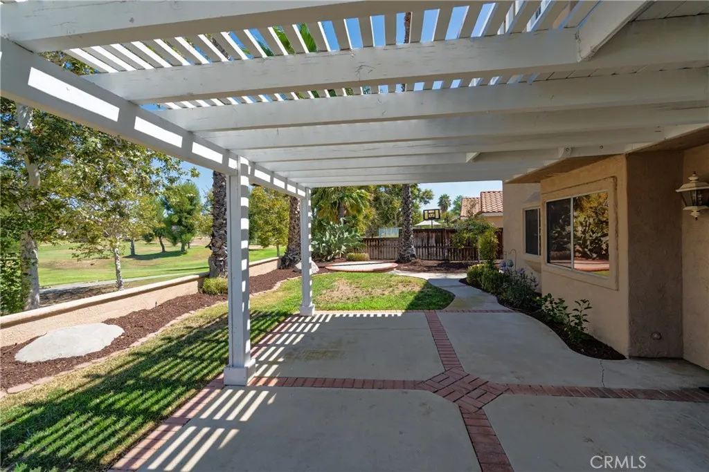 Covered patio. Golf course is on the left.