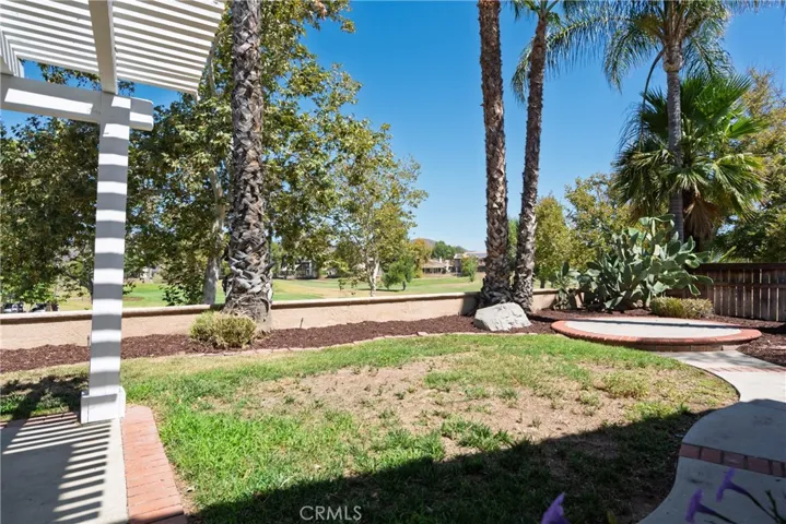View of the golf course from the backyard.