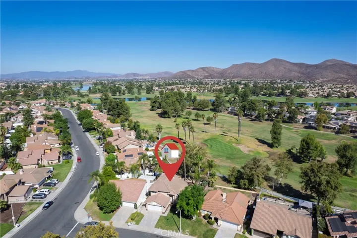 Aerial view with  the foothills and golf course in the in the background.