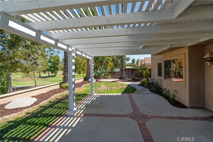 Covered patio. Golf course is on the left.