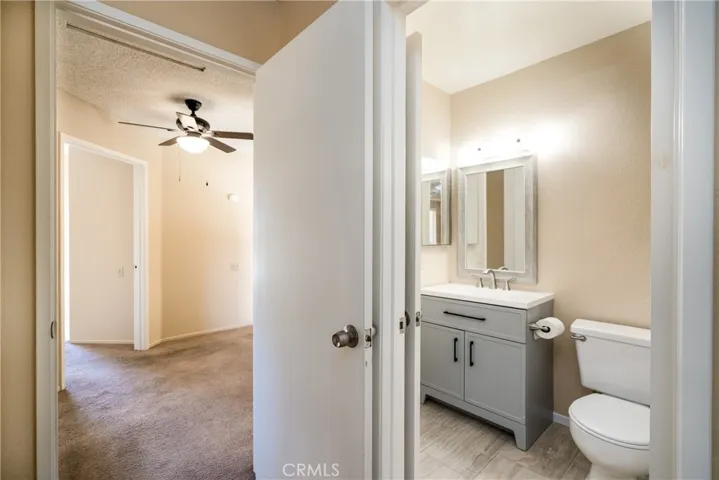 Bathroom #3 that connects  to bedroom #4 and hallway. Bathroom has been remodeled.