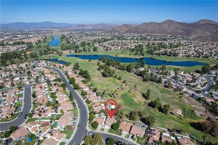 Beautiful aerial view of the lake and golf course and foothills.