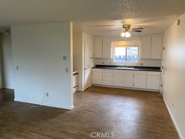 Kitchen with door to garage on the right.