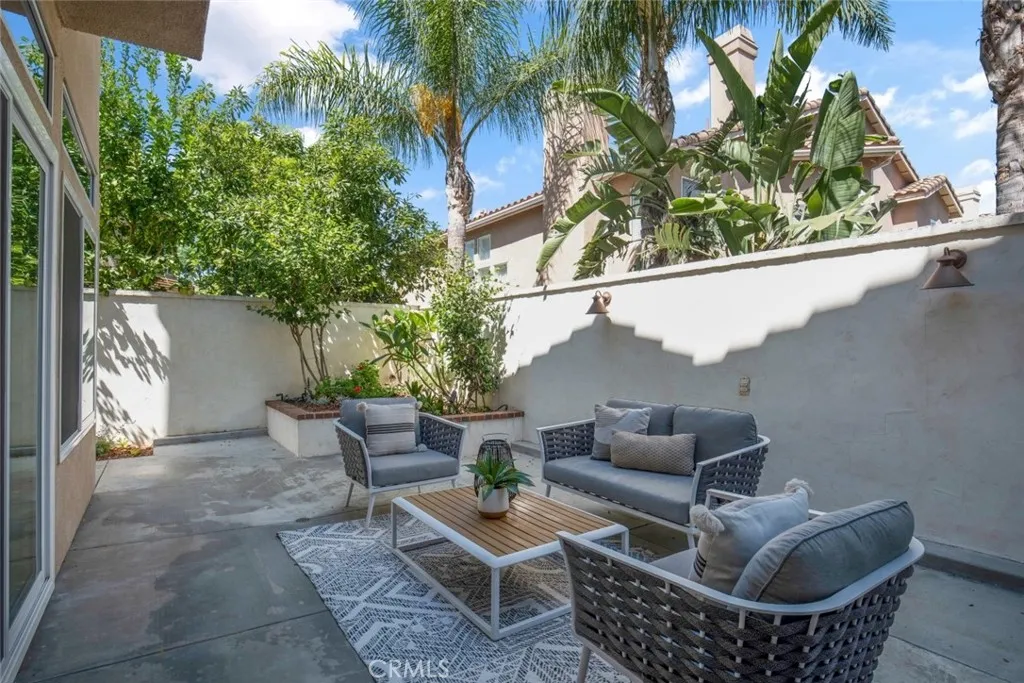 Enjoy your patio with high wall for added privacy