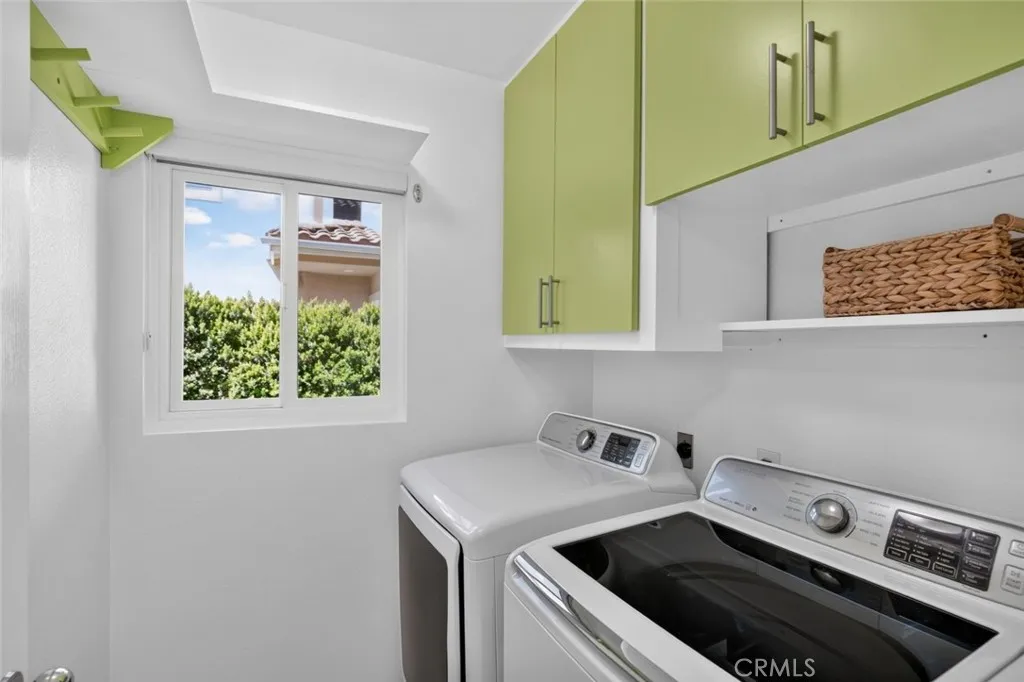 Indoor laundry with storage, washer & dryer included