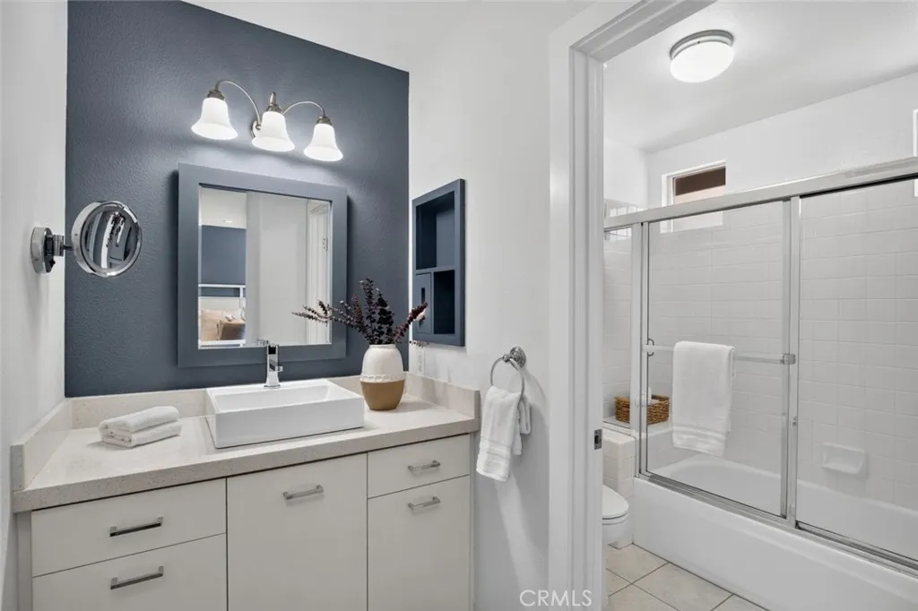 Bathroom with shower and tub in dedicated room for added privacy