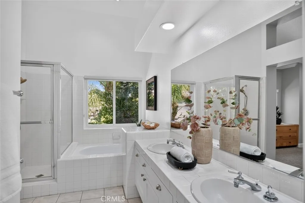 Primary bathroom with dual vanity and soaking tub