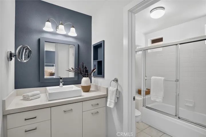 Bathroom with shower and tub in dedicated room for added privacy
