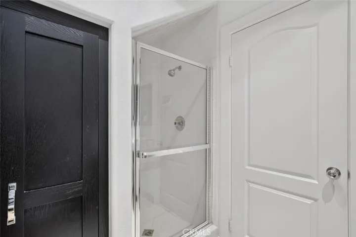 Bathroom on first level with a shower