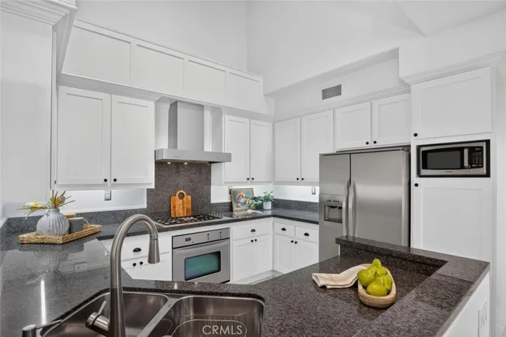 OPen kitchen with custom cabinetry