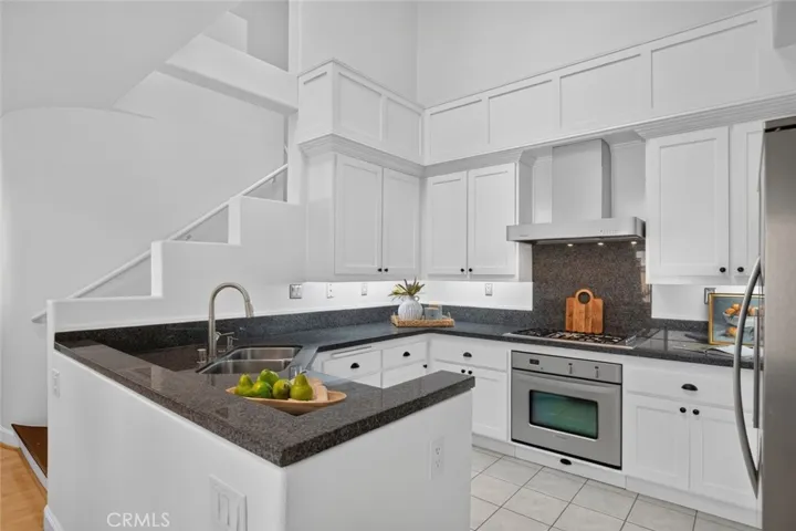Ample storage in the tall cabinetry