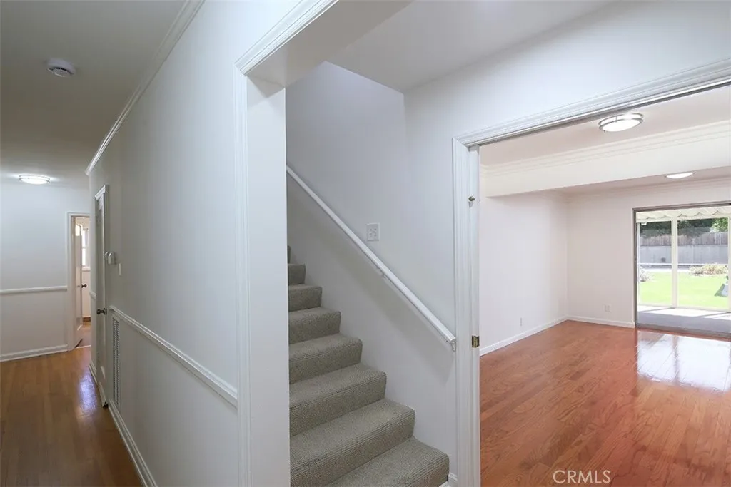 Hallway leads to Family Room, Stairs, Bedrooms, and Bathroom
