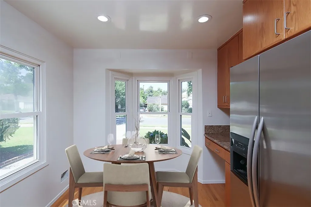 Kitchen with Breakfast Nook and Bay Window-Virtually Staged