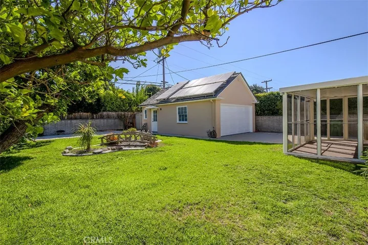 Backyard with View of Solar Panels on Roof
