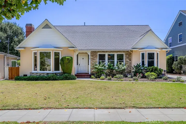 Front of House with 2 Bay Windows