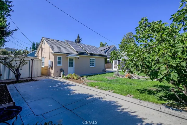 Back of Property with Shed behind Garage