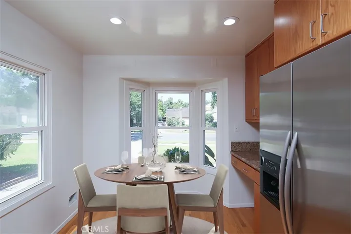 Kitchen with Breakfast Nook and Bay Window-Virtually Staged