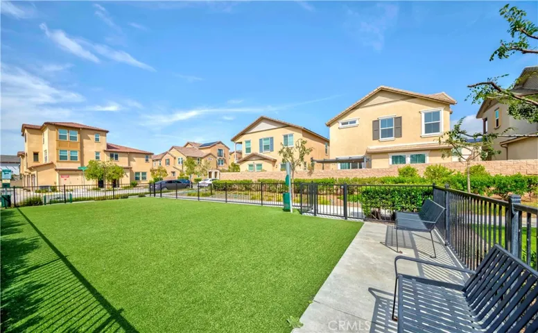 The community also includes a convenient dog park, providing a dedicated space for residents and their four-legged companions to enjoy the outdoors