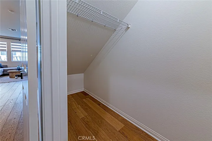 A spacious downstairs closet provides ample storage space