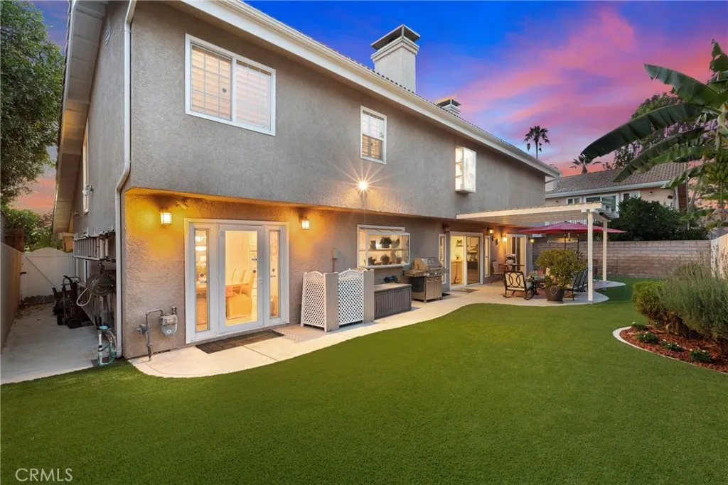 Spacious backyard with turf