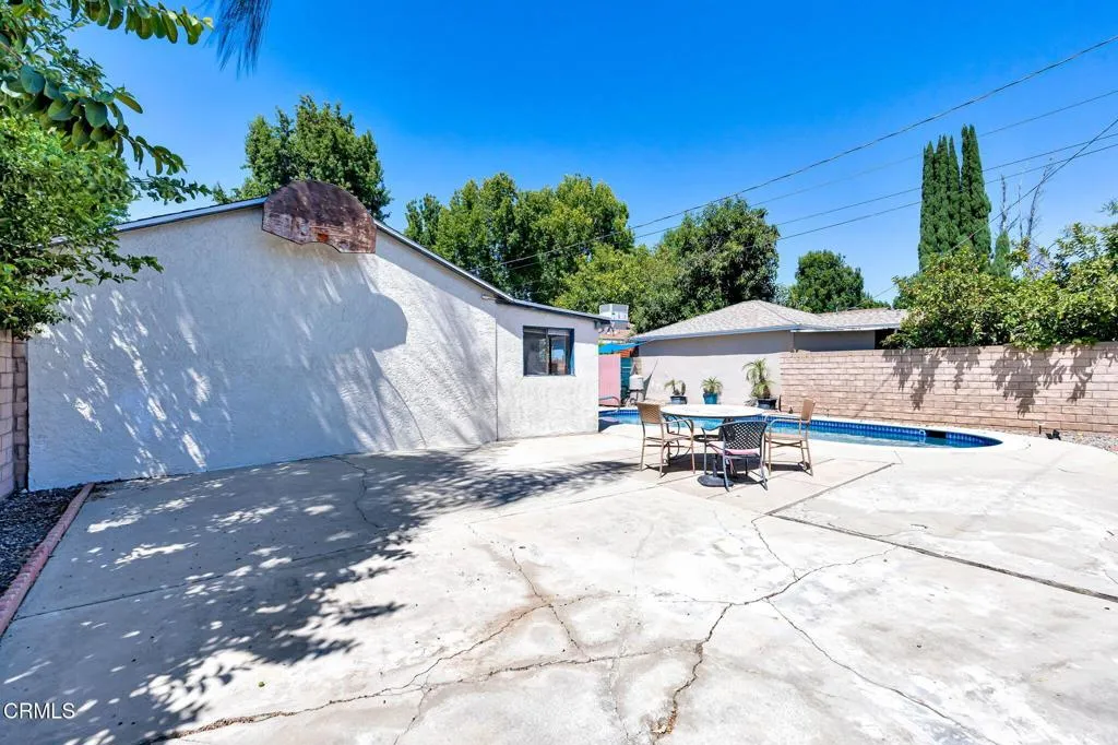 Backyard patio by pool Backyard patio by pool