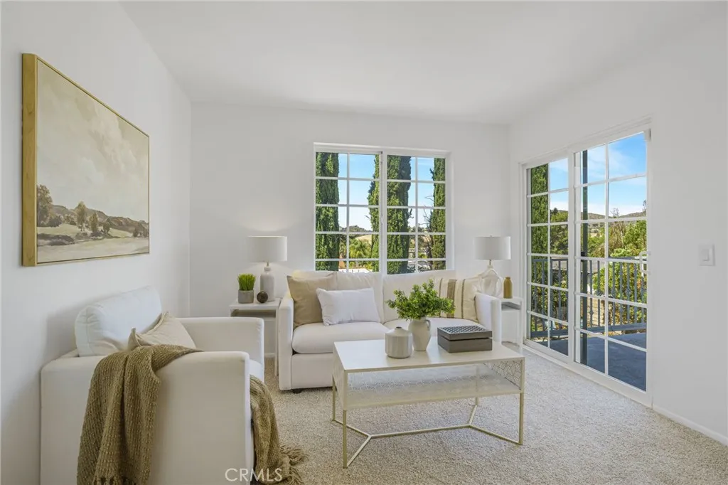 Primary Suite Sitting Area with Balcony