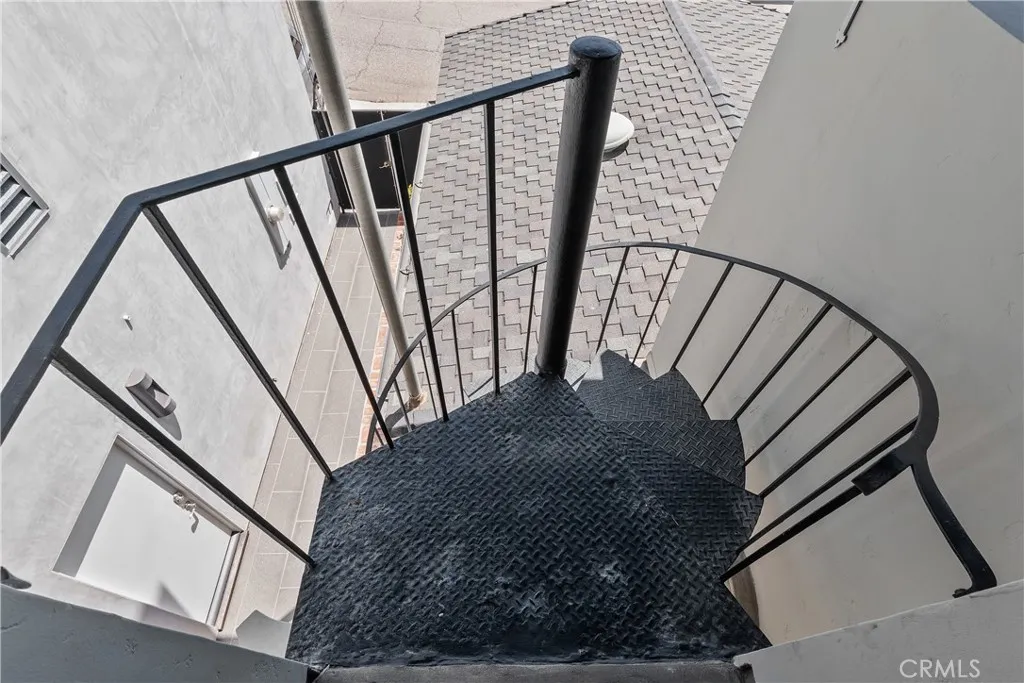 Staircase from balcony to the ground floor