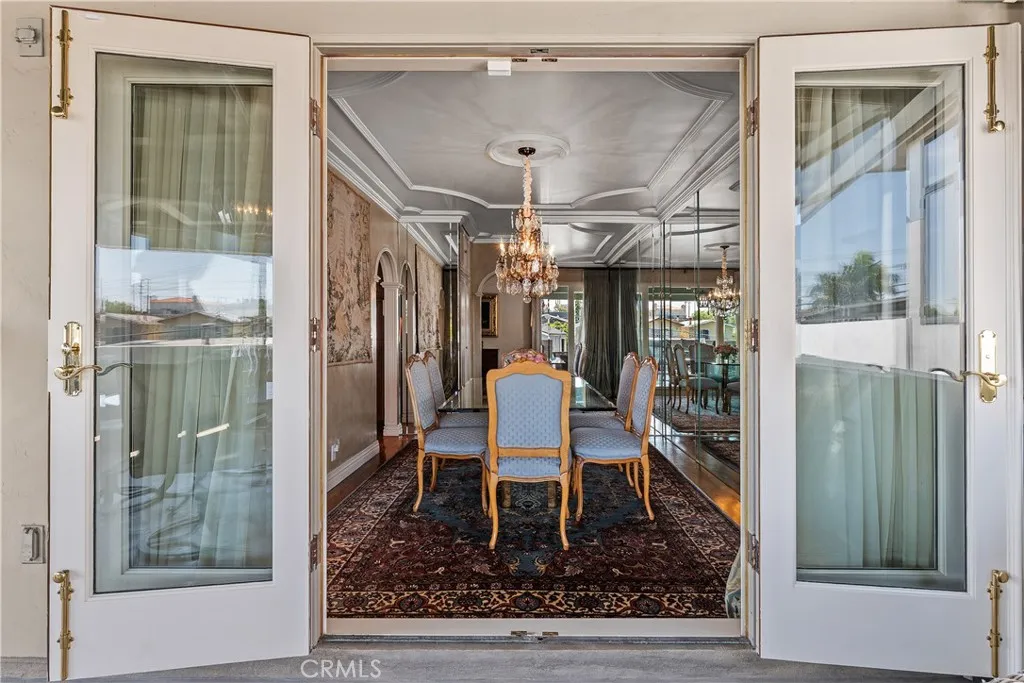 Dining room opening to balcony