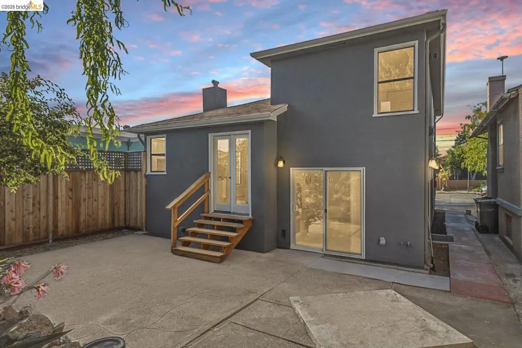Rear exterior featuring a concrete patio