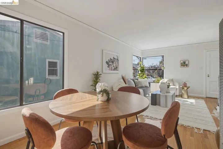 Hardwood flooring extends throughout this open-concept living​​‌​​​​‌​​‌‌​​‌​​​‌‌​​​‌​​‌‌​​‌‌​​‌‌​​​​ area