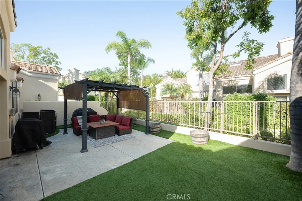 Relax on the back patio with low maintenance synthetic turf. Relax on the back patio with low maintenance synthetic turf.