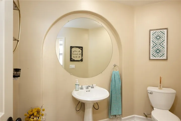 Guest bathroom located downstairs.