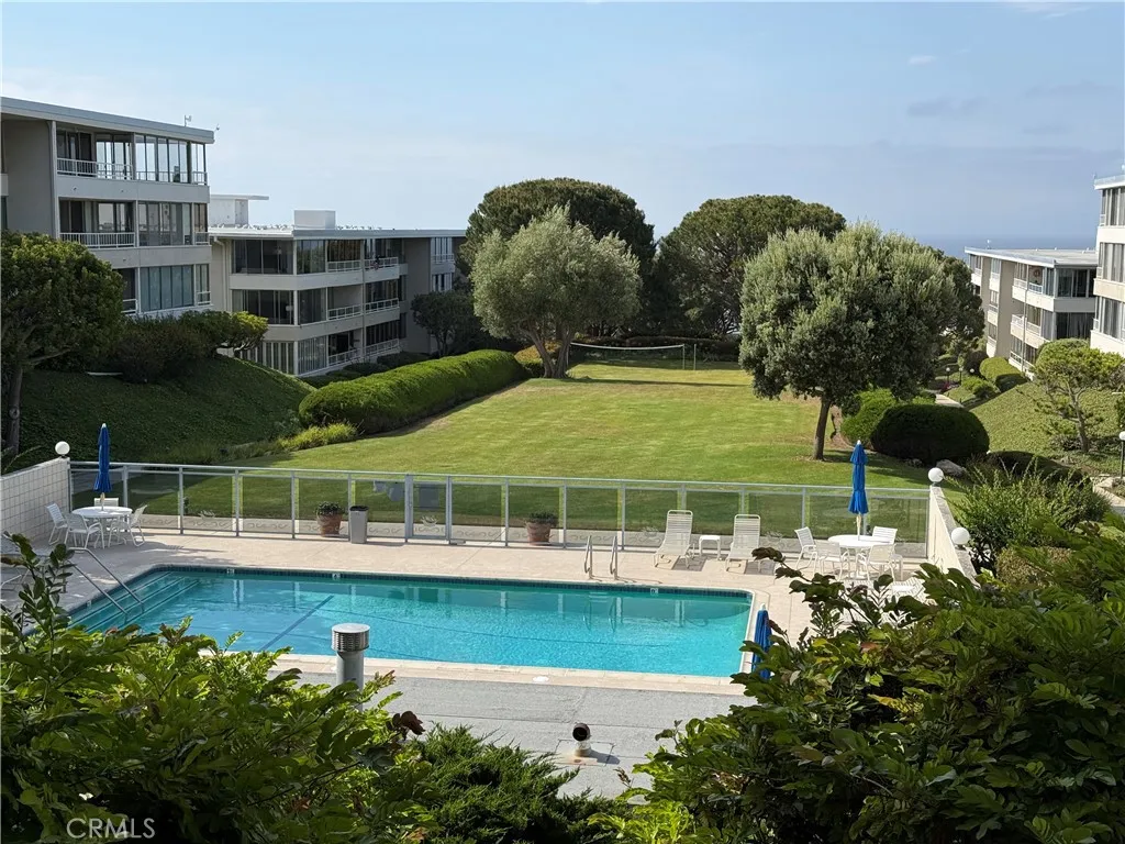 upper pool and spa just outside of building