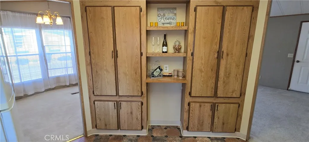 More cabinets & shelves in kitchen