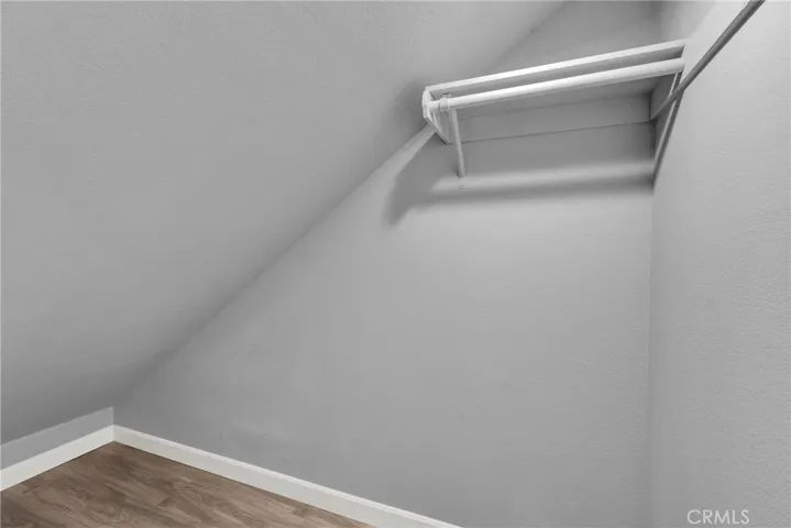 Extra storage space underneath stairs with new flooring