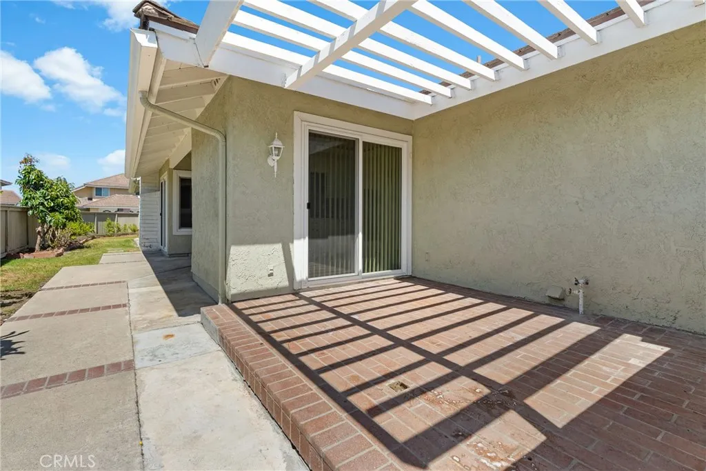 Side yard left-patio outside kitchen