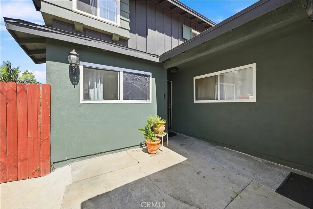 Porch area. Can add a pergola or a patio cover. The window film can be removed.