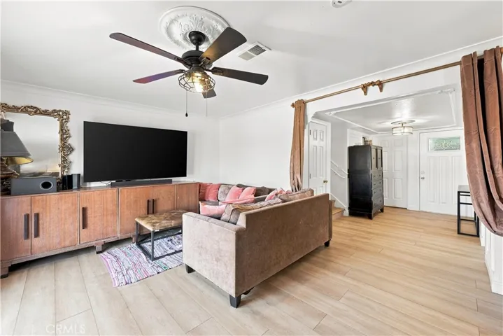 Family room with ceiling fan