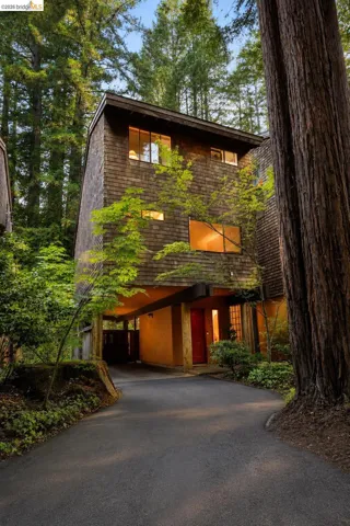 Shingle-sided exterior with varied window placements