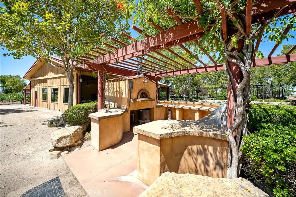 Outdoor kitchen with oven and BBQ Outdoor kitchen with oven and BBQ