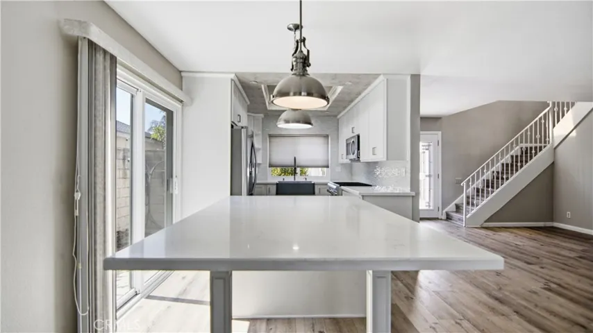 Large kitchen island in remodeled kitchen