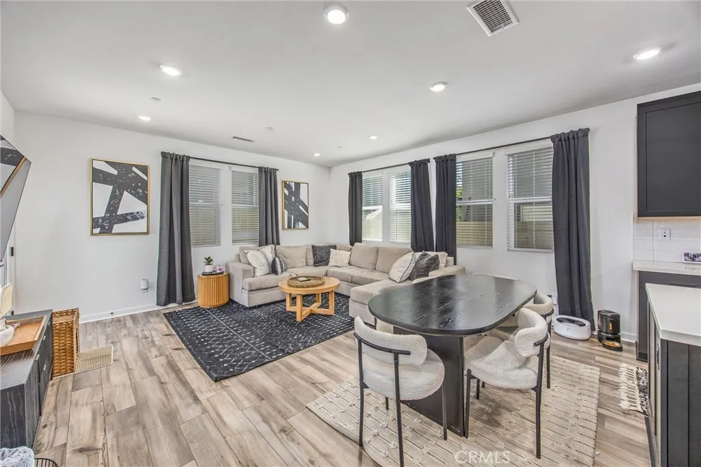 Spacious living and dining areas with an open layout and abundant natural light