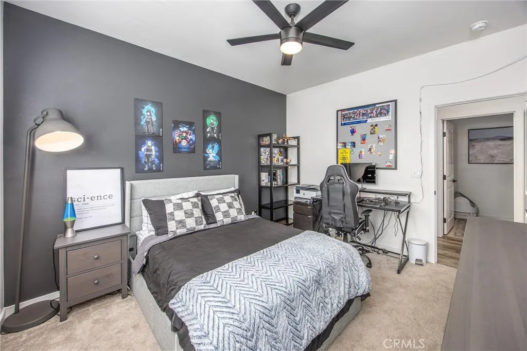 Well-sized secondary bedroom offers comfortable space with room for a dedicated study or workspace