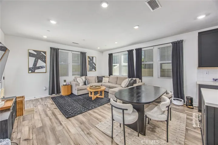 Spacious living and dining areas with an open layout and abundant natural light