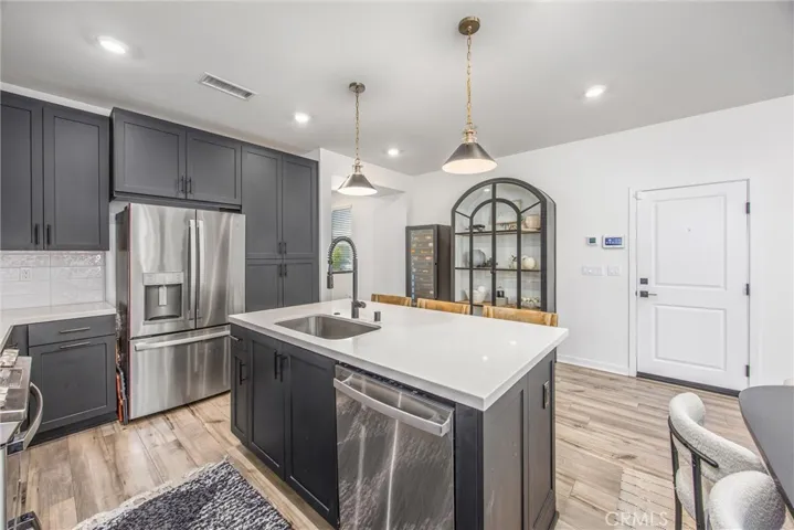 Stainless steel appliances add a polished finish to this well-designed kitchen