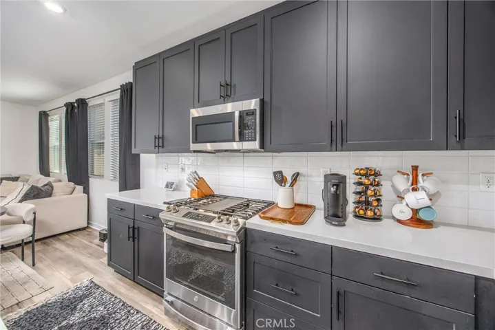 Generous counter space and extensive cabinetry provide plenty of storage and workspace