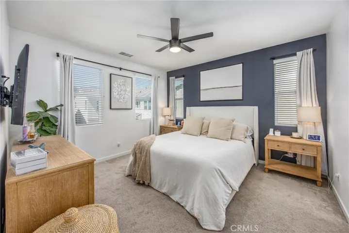 Primary bedroom offering generous space and a bright, airy setting