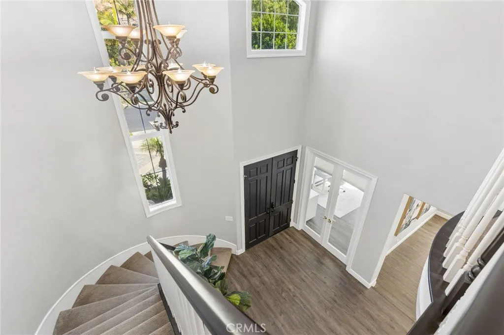 Head up the grand staircase to 4 more bedrooms, plus a large loft
