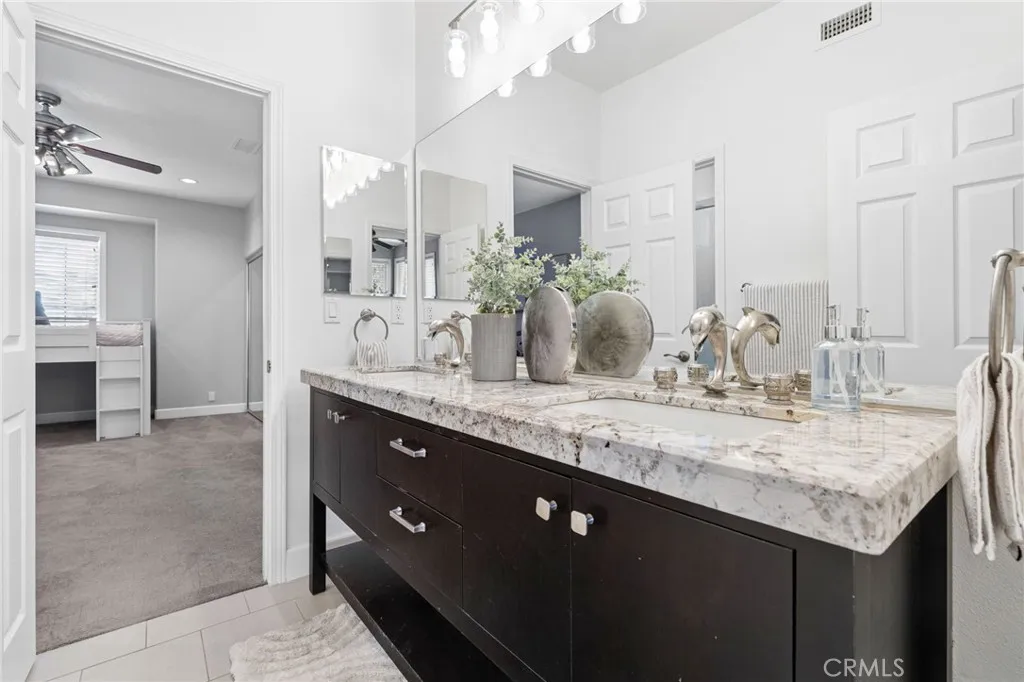 Beautiful jack-n-jill bathroom with custom faucets